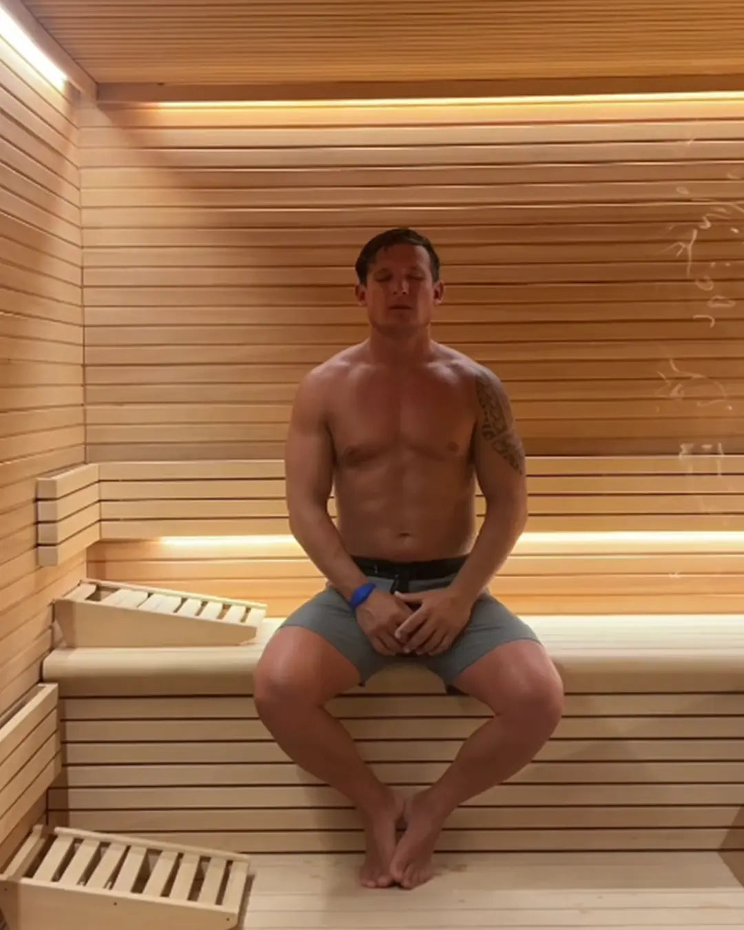 Man resting in a sauna